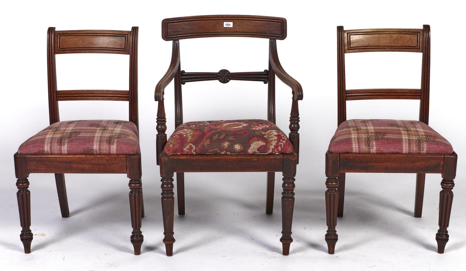 A post Regency mahogany scroll arm elbow chair, with tablet top rail, the horizontal rail centred on