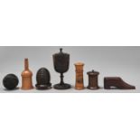 Treen. A Lignum Vitae cup and cover, Victorian sycamore glover powderer, a Victorian fruitwood