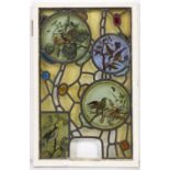 A Victorian stained glass window, with three  roundels and a rectangular panel all painted with