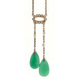 A green stone, seed pearl and split pearl negligee pendant-necklet, c1910, in gold, 40cm, marked 9c,