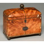 A Regency tortoiseshell tea caddy, c1820, the lid in blond shell, wire stringing, brass