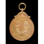 A 9ct gold watch fob prize medal of the Nottingham and Notts Chrysanthemum Society, obverse flowers,