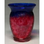 A mottled blue and cranberry glass vase, 1930s  with flared neck, 21cm h Good condition