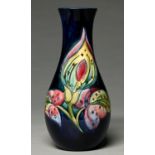 A Moorcroft Arum Lily vase, c1960, 27cm h, impressed marks, blue painted signature Good condition