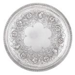 A Victorian silver fruit dish, with floral chased border and straight gadrooned rim, 23cm diam, by R