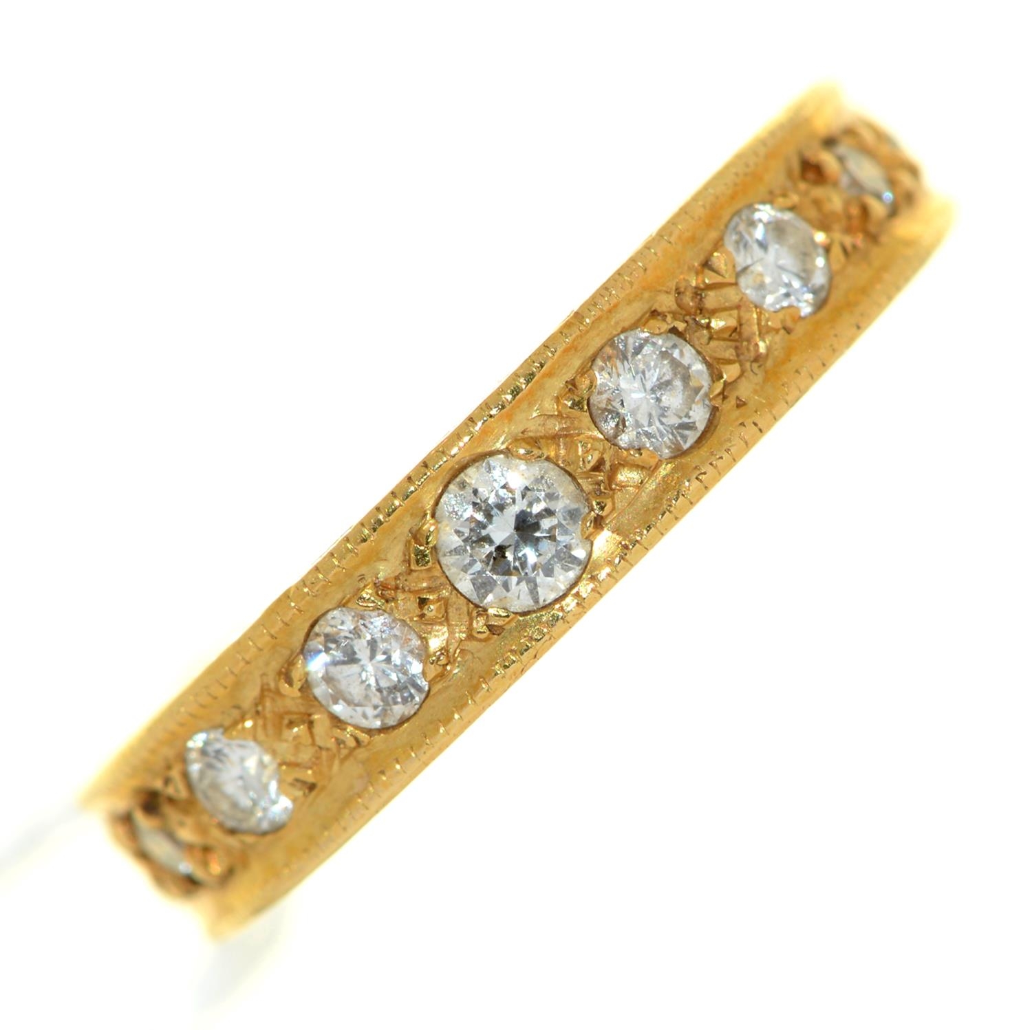 A nine stone diamond ring, in 18ct gold, London 1975, 5.1g, size L Good condition