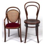 Thonet - A child's bentwood chair, with oval caned back, drop in seat upholstered in red draylon,