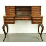 A French rosewood writing table,   c1860, the superstructure with applied bead and reel moulding