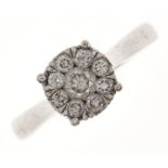 A diamond cluster ring, in 9ct white gold, marked 0.50, 2.8g, size M Good condition