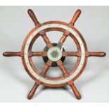 A teak ships wheel, early 20th c, chromium plated metal mount and shaft, 52cm over handles Plating