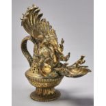 An Indian brass Ganesh form votive oil lamp, late 19th / early 20th c, 34cm h Good condition, old