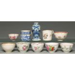 Five Worcester and other English porcelain tea bowls, an earthenware example, two coffee cans, a