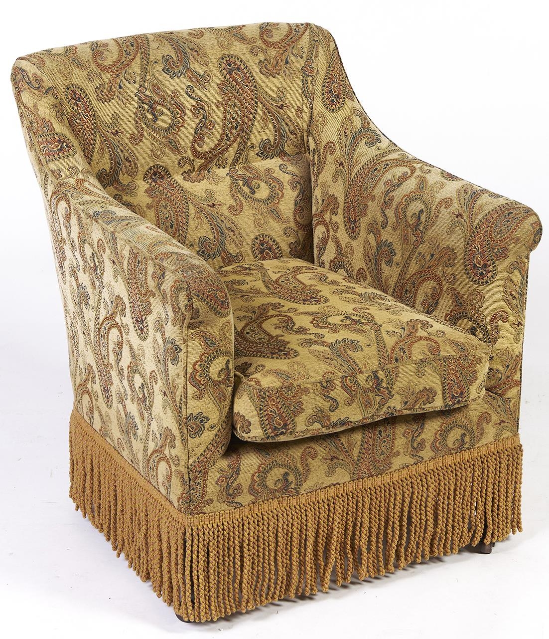 An Edwardian mahogany  chair, reupholstered in boteh decorated fabric, fringed, square tapered