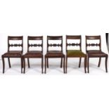 A set of five Victorian mahogany dining chairs, with tablet centred and leaf carved centre rail,