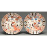 A pair of Chinese export famille rose soup plates, 19th c, painted with peafowl and tree peony, 25cm