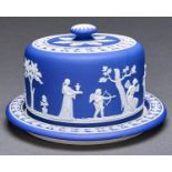A Wedgwood dark blue jasper dip cheese dish and cover, late 19th c, sprigged with classical figures,