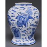 A Chinese blue and white jar, Qianlong period, painted with mythical beasts, 26cm h, Kangxi mark