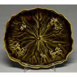 Dr Christopher Dresser. A Linthorpe green majolica lily pad shaped dish or tray, c1885, moulded in
