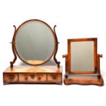 A George III mahogany dressing mirror, the rectangular base fitted three drawers, 60cm h and a
