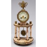 A French gilt lacquered brass and marble colonnade clock, c1900, in Louis XVI style, the drum