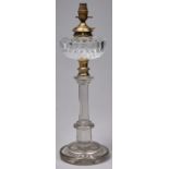 An Edwardian cut glass oil lamp and detachable fount, 50cm h excluding later electric bulb holder