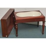 A Victorian mahogany bidet and cover, on turned legs, with earthenware pan, 47cm h; 42 x 67cm