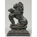 A Victorian cast iron lion rampant door stop, 38cm h Good condition with only minor rust