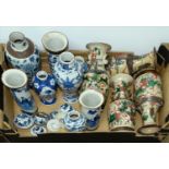 A collection of Chinese blue and white and other vases, late 19th c and later, including crackle