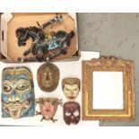 Tribal Art. Miscellaneous polychrome masks, a puppet and gilt wall mirror, 20th c A decorative in