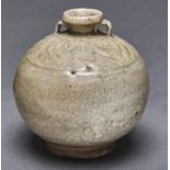 A Korean globular celadon vase, with pale shaded olive-cream glaze and carved with band of