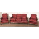 A walnut and caned bergere suite, mid 19th c, of three seat sofa and pair of armchairs