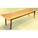 A French cherry wood farmhouse table, 19th c, the two plank top with slide at with end, on square