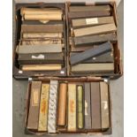 Three boxes of pianola and other player piano music rolls