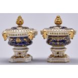 Two Derby cobalt ground pot pourri vases and later matching Royal Crown Derby covers, c1820, of