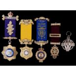 Two masonic silver jewels and three other fraternal / friendly society silver gilt jewels