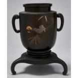 A Japanese inlaid bronze vase, Meiji period, carved with bamboo and decorated with two birds and