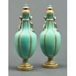 A pair of English porcelain vases and covers, possibly Coalport, c1860, in Sevres style, the