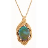 A black opal pendant, in gold marked 18k, on a gold necklet marked 750, 2.2g Good condition