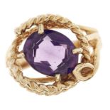A synthetic colour change sapphire ring, in gold marked 14KG, 5.5g, size K Good condition