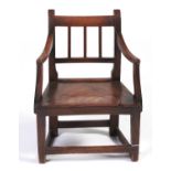 Miniature Furniture. A George IV elm elbow chair, c1830, with boarded seat, seat height 21.5cm h