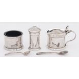 A George VI silver condiment set, blue glass liners, mustard pot 45mm h, by Barker Brothers Silver