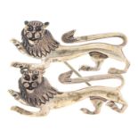 A silver twin lion brooch, 43mm, maker’s mark SG in monogram and 800 Good condition