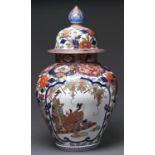 A Japanese Imari jar and cover, Taisho period, enamelled with groups of bijin and a child seated