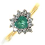 An emerald and diamond cluster ring, in gold marked 750, 2.7g, size L Good condition