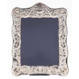 An Elizabeth II silver photograph frame,  backed on navy velvet, 37cm h, by Carrs of Sheffield,