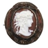 A Victorian cameo brooch, the oval shell carved with the head of a classical maiden, mounted in