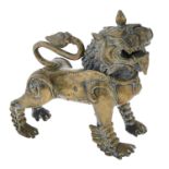 An Indian brass sculpture of a lion, 19th / early 20th c, 21cm h Tail loose and polish residue