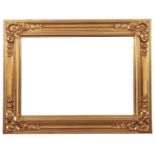 A reproduction gilt mirror, with bevelled plate, 70 x 90cm Good condition