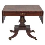 A George IV brass mounted and line inlaid rosewood sofa table, c1830, fitted with drawers, the