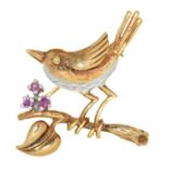 A ruby bird-on-a-branch brooch, in two colour 9ct gold, 34mm, import marked London 1970, 2.8g Good